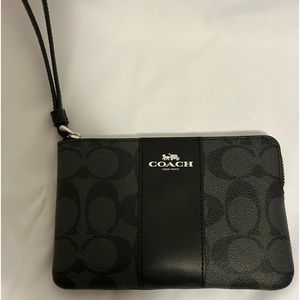 NWT Coach Wristlet. Black Graphlite Black Color. NWT